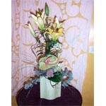 Bouquet Hauteur travaill� dans un joli contenant.