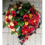 Souvenirs venant du coeur en art floral pour un d�funt aim� et regrett�.