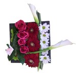 Composition piqu�e dans une assiette en zinc noir compos� au choix avec : roses, tokyo, tournesol, santini, arum...suivant saison � partir de 25�