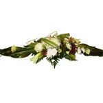 Bel assemblage de fleurs pr�cieuses et blanches dans son habillage de feuillage. Il peut �tre r�alis� avec d autres fleurs et de coloris diff�rents.