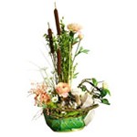Composition de fleurs s�ch�es et tergal dans panier.
Pi�ce unique selon saison et arrivage (fleurs s�ch�es et animaux d�co) (� partir de 75 euros)